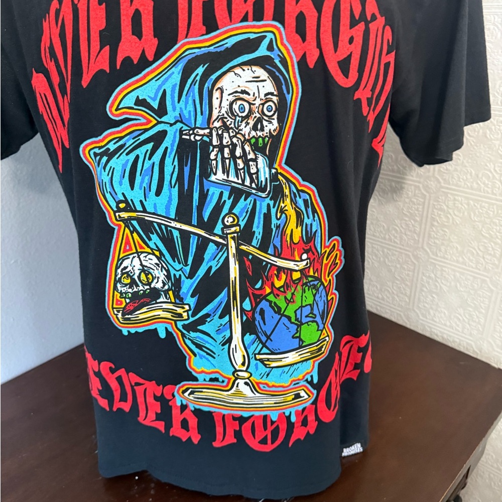 Edgy Black Graphic Tee with Vibrant Design